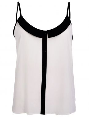 More about MiSMASH Spanish women's black and white top.